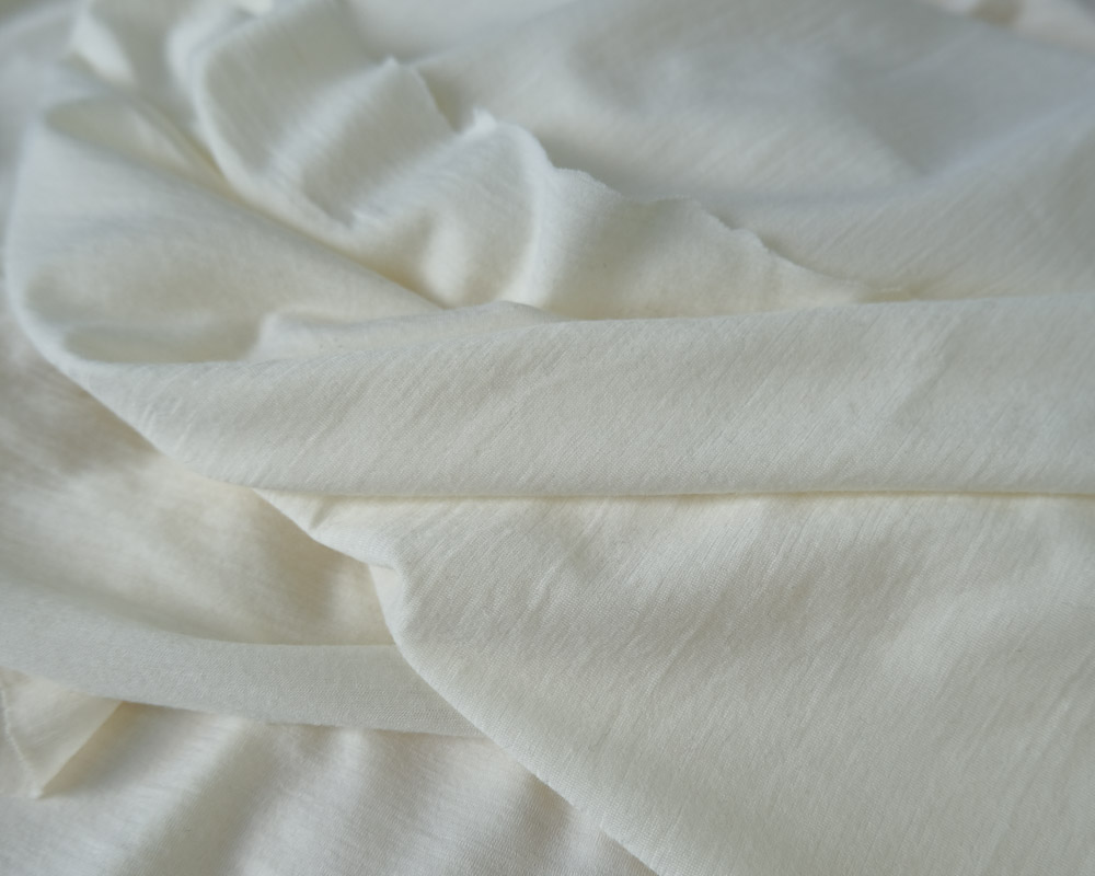 Betekenisvol Afslachten vlam White - Wool Jersey | Lyrical Fabrics